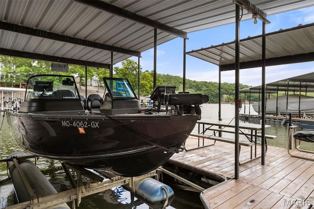 63 Portwood Meadows Rd, Rocky Mount, MO 65072 - dock area featuring boat lift