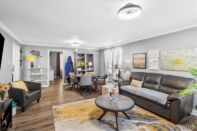 2929 Lincoln Ave, Saint Louis, MO 63121 - living room featuring ornamental molding, wood finished floors, and baseboards