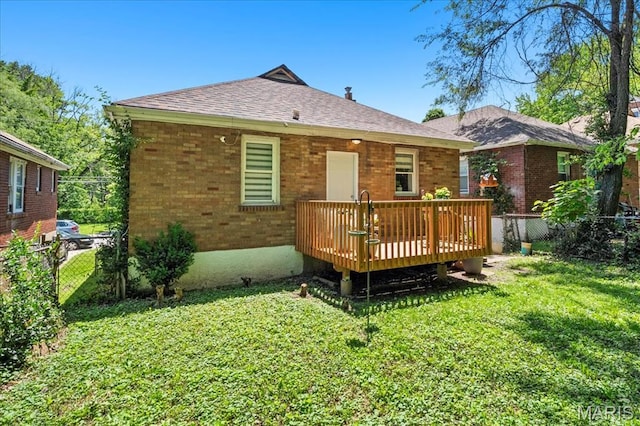 2929 Lincoln Ave, Saint Louis, MO 63121 - back of property with a wooden deck, a shingled roof, and brick siding