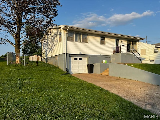 16 Wauneta Pl, Hannibal, MO 63401 - view of front of home featuring an attached garage, driveway, and stairs