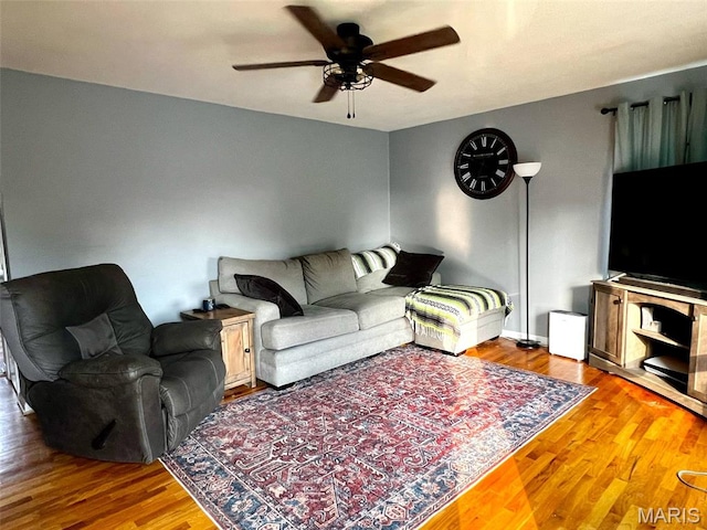 16 Wauneta Pl, Hannibal, MO 63401 - living room featuring ceiling fan and wood finished floors