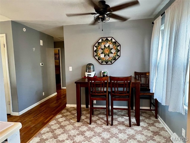 16 Wauneta Pl, Hannibal, MO 63401 - dining area featuring ceiling fan, light wood-style floors, and baseboards
