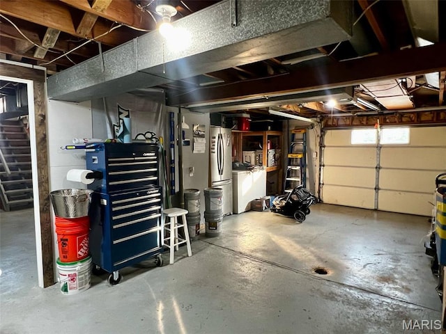 16 Wauneta Pl, Hannibal, MO 63401 - garage with freestanding refrigerator and washer / dryer