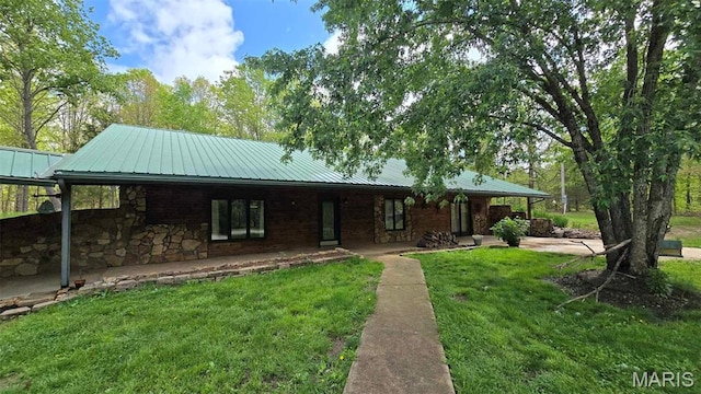 11863 Windy Curve Ln, Success, MO 65570 - view of front of home with a front lawn, metal roof, stone siding, and a porch