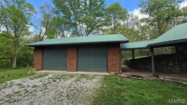 11863 Windy Curve Ln, Success, MO 65570 - garage featuring a detached garage and driveway