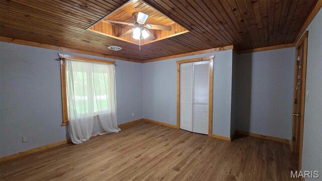 11863 Windy Curve Ln, Success, MO 65570 - spare room with wood finished floors, wooden ceiling, ceiling fan, and baseboards