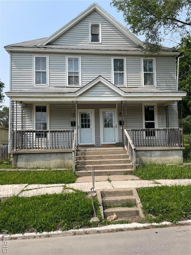 1908-19 Hope St, Hannibal, MO 63401 - traditional style home with a porch
