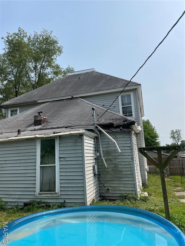 1908-19 Hope St, Hannibal, MO 63401 - back of house featuring an outdoor pool