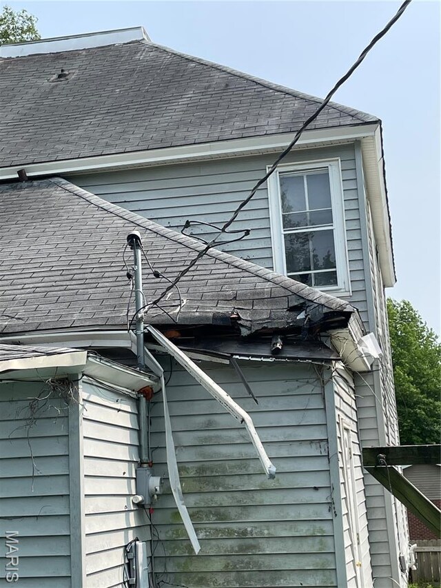 1908-19 Hope St, Hannibal, MO 63401 - exterior view of roof with shingles and electric meter