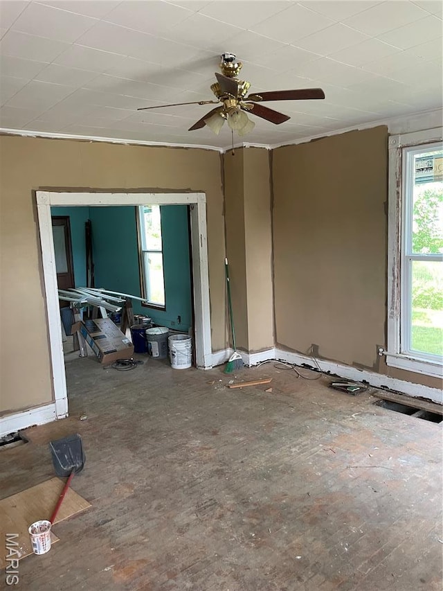 1908-19 Hope St, Hannibal, MO 63401 - unfurnished room featuring healthy amount of natural light and ceiling fan