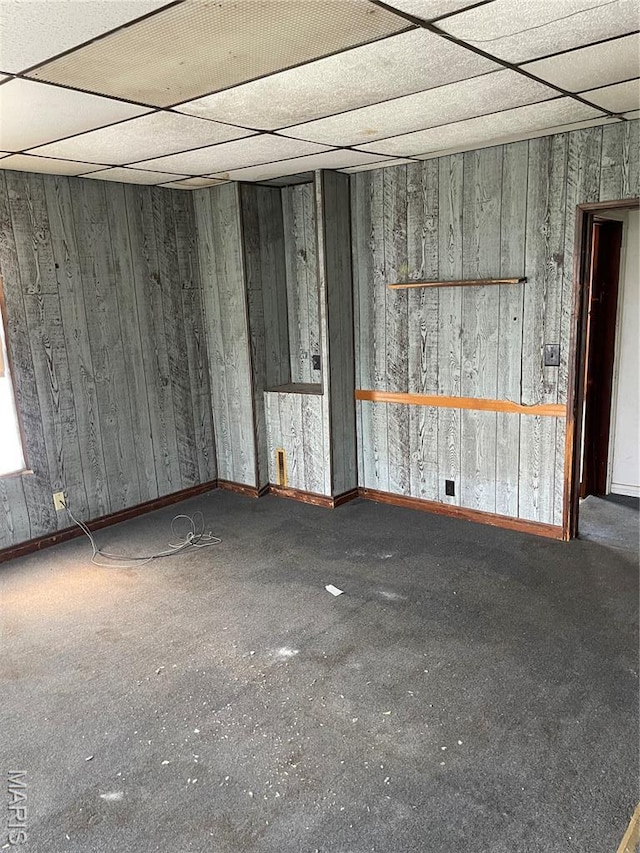 1908-19 Hope St, Hannibal, MO 63401 - empty room with a paneled ceiling and baseboards