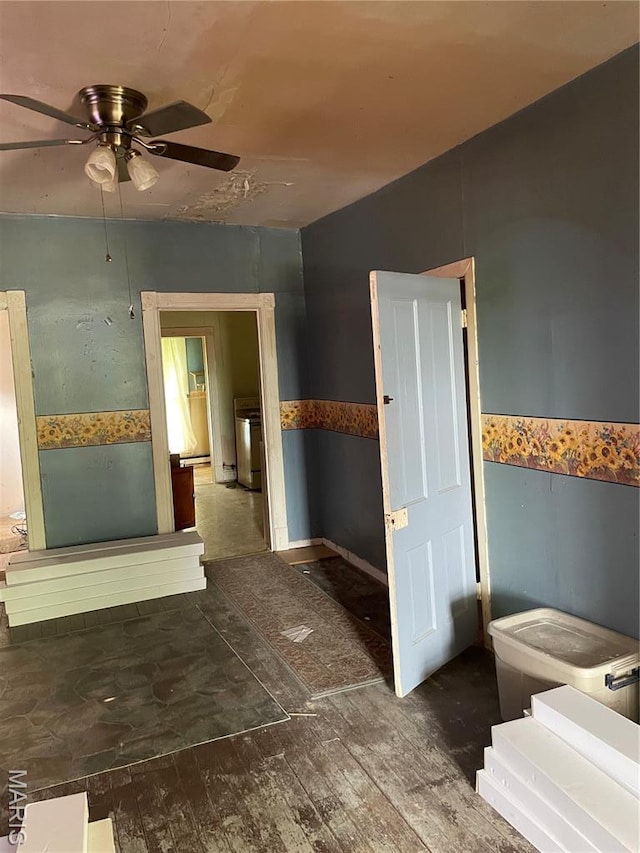 1908-19 Hope St, Hannibal, MO 63401 - bathroom featuring a ceiling fan, wood-type flooring, and toilet