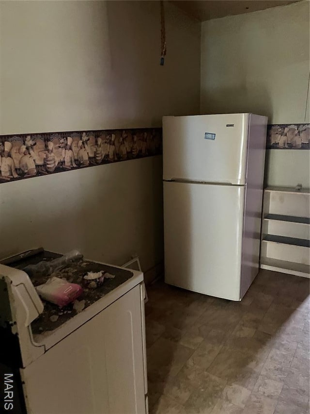 1908-19 Hope St, Hannibal, MO 63401 - kitchen with freestanding refrigerator and washer / clothes dryer