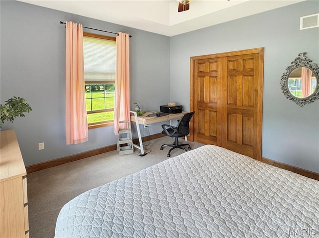 495 Oak Field Ct, Washington, MO 63090 - bedroom with carpet flooring, baseboards, and an office area
