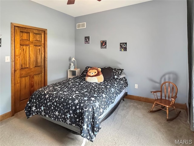 495 Oak Field Ct, Washington, MO 63090 - bedroom with carpet flooring, baseboards, and a ceiling fan