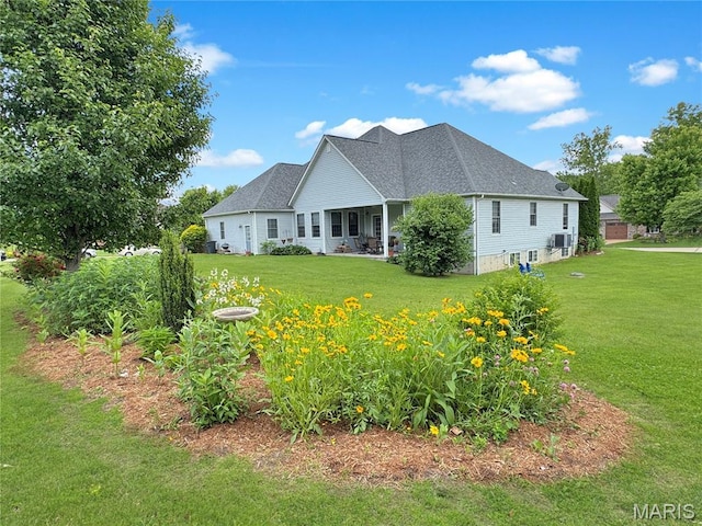 495 Oak Field Ct, Washington, MO 63090 - back of house featuring a yard and a shingled roof