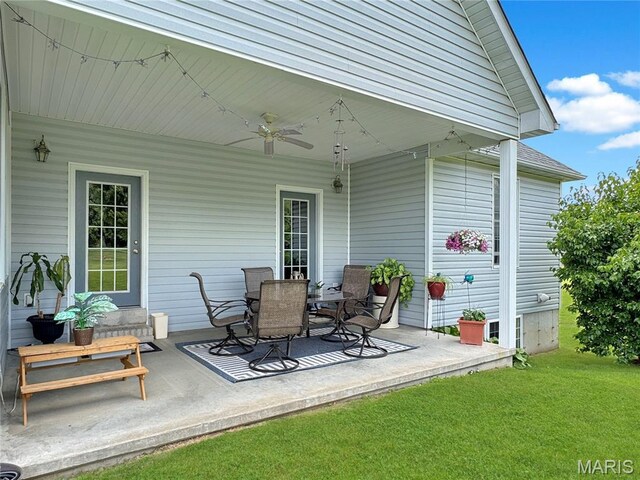 495 Oak Field Ct, Washington, MO 63090 - view of patio with a ceiling fan and outdoor dining area