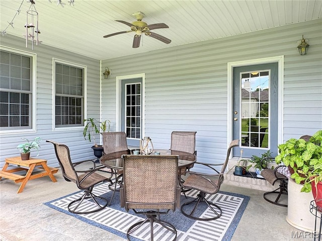 495 Oak Field Ct, Washington, MO 63090 - view of patio with outdoor dining area and ceiling fan