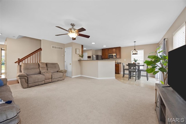 27 Brushy Brook Ct, Ofallon, MO 63366 - living room with a ceiling fan, light colored carpet, baseboards, and recessed lighting