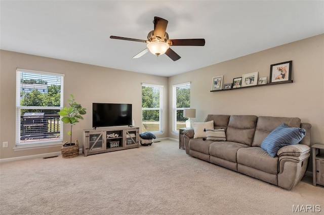 27 Brushy Brook Ct, Ofallon, MO 63366 - carpeted living room with ceiling fan, healthy amount of natural light, and baseboards