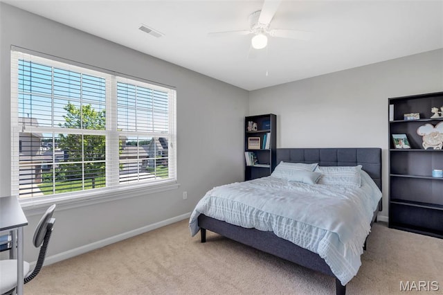 27 Brushy Brook Ct, Ofallon, MO 63366 - carpeted bedroom featuring multiple windows, baseboards, and a ceiling fan