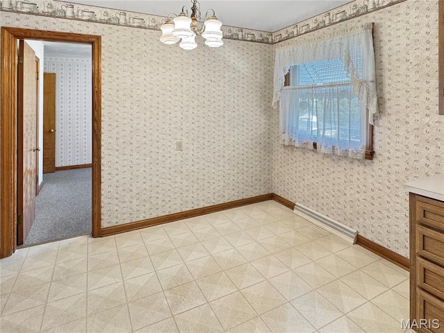 1508 3rd Pkwy, Washington, MO 63090 - unfurnished dining area with light floors, a chandelier, baseboards, and wallpapered walls