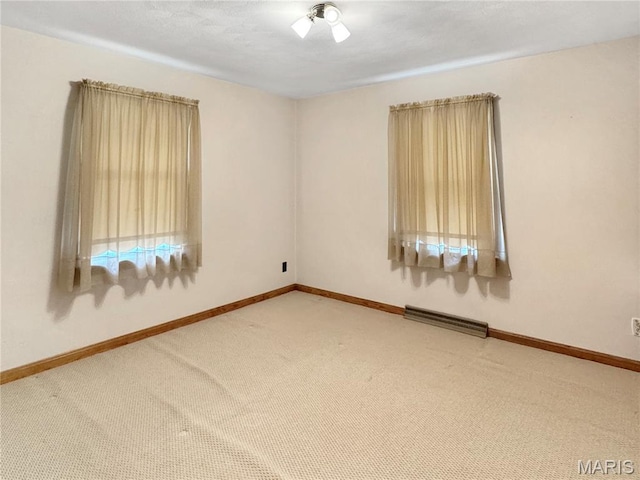 1508 3rd Pkwy, Washington, MO 63090 - empty room featuring carpet floors and baseboards