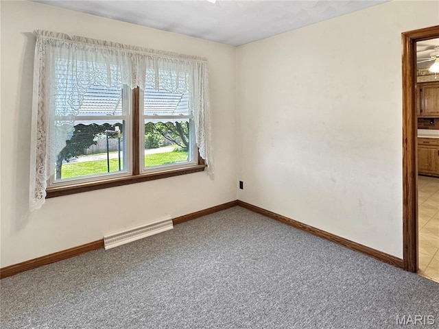 1508 3rd Pkwy, Washington, MO 63090 - empty room featuring light carpet and baseboards