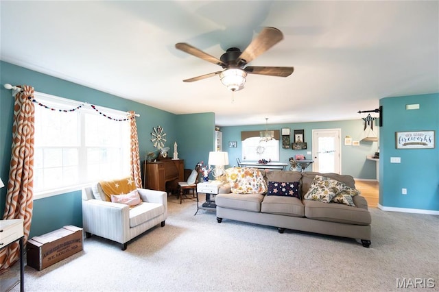 15701 County Road 1130, St James, MO 65559 - carpeted living room featuring ceiling fan and baseboards