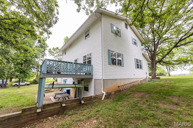 15701 County Road 1130, St James, MO 65559 - view of property exterior featuring a yard and a deck