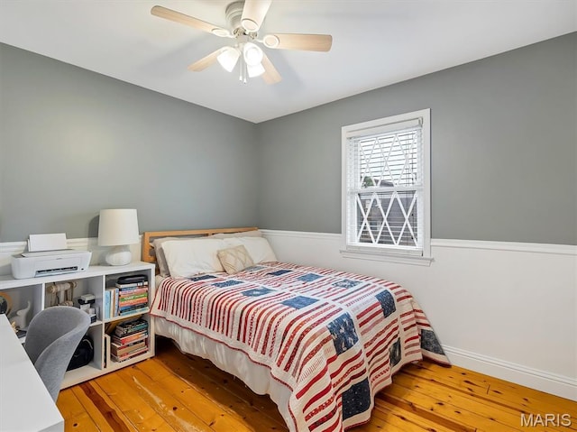 1015 Marilyn Ct, Washington, MO 63090 - bedroom with hardwood / wood-style floors and a ceiling fan