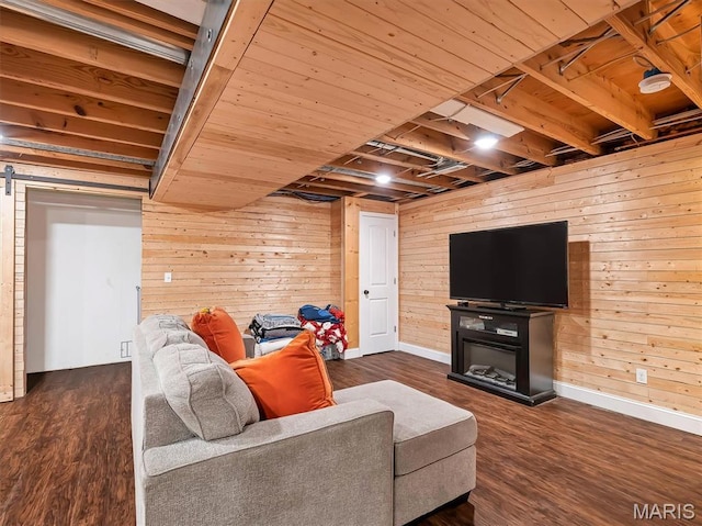 1015 Marilyn Ct, Washington, MO 63090 - living room with wooden walls, wood finished floors, wood ceiling, and a glass covered fireplace