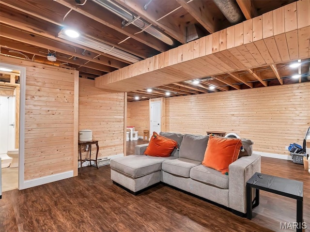 1015 Marilyn Ct, Washington, MO 63090 - living area with dark wood-style flooring and wooden walls