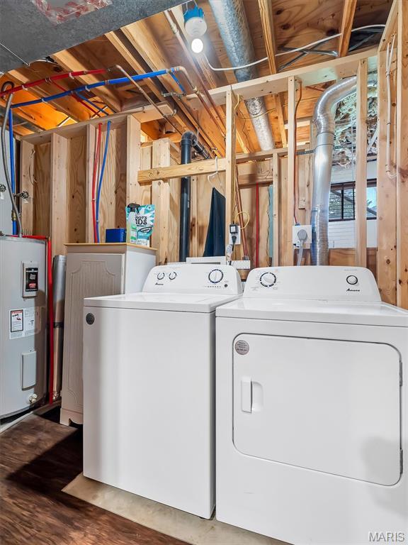 1015 Marilyn Ct, Washington, MO 63090 - laundry room with water heater, separate washer and dryer, and wood finished floors