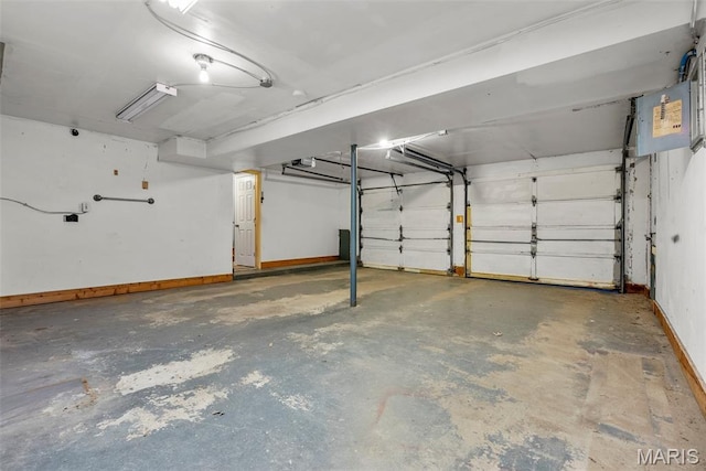 4618 Towne Hall Dr, Arnold, MO 63010 - garage featuring baseboards and a garage door opener