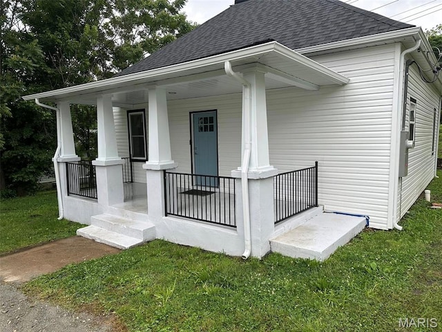 618 Taylor Ave, Park Hills, MO 63601 - view of front of home with a shingled roof, a porch, and a front yard