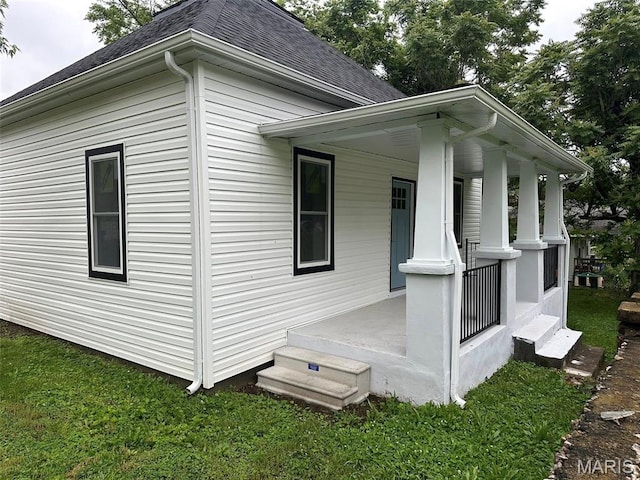 618 Taylor Ave, Park Hills, MO 63601 - view of side of property featuring covered porch, a shingled roof, and a lawn