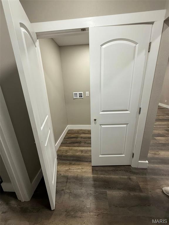 618 Taylor Ave, Park Hills, MO 63601 - laundry area featuring dark wood finished floors, baseboards, and hookup for a washing machine
