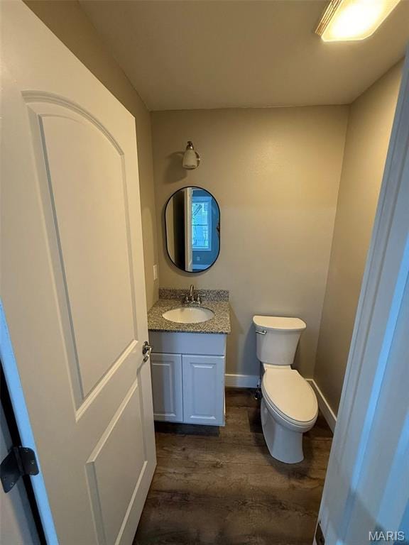618 Taylor Ave, Park Hills, MO 63601 - bathroom with wood finished floors, vanity, and toilet