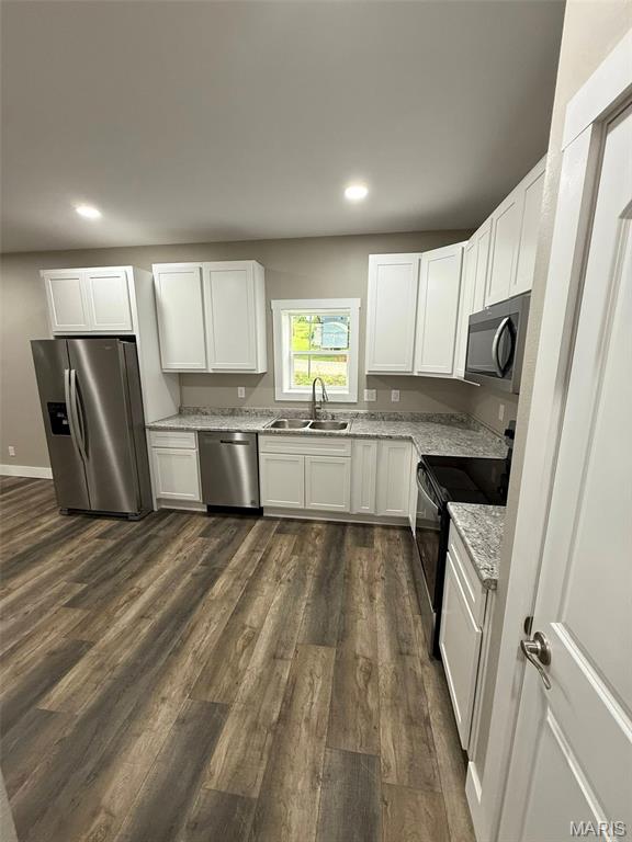 618 Taylor Ave, Park Hills, MO 63601 - kitchen featuring stainless steel appliances, a sink, dark wood finished floors, light stone countertops, and recessed lighting