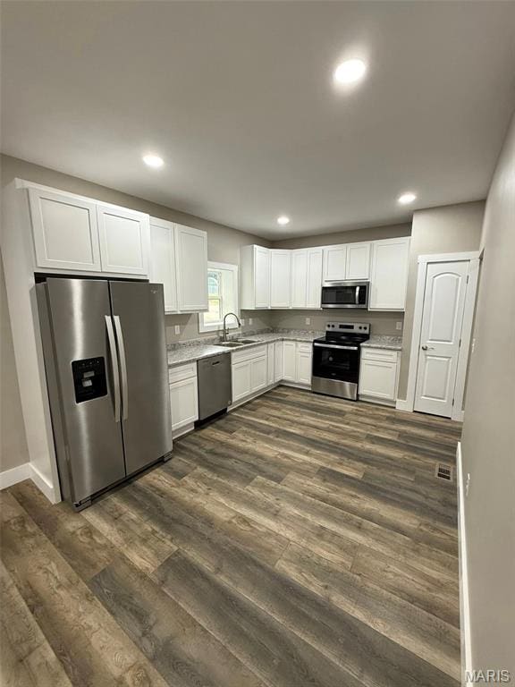 618 Taylor Ave, Park Hills, MO 63601 - kitchen featuring stainless steel appliances, a sink, white cabinets, recessed lighting, and dark wood finished floors