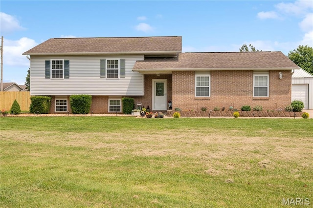 121 Melissas Dr, Jackson, MO 63755 - split level home with brick siding, a garage, and roof with shingles