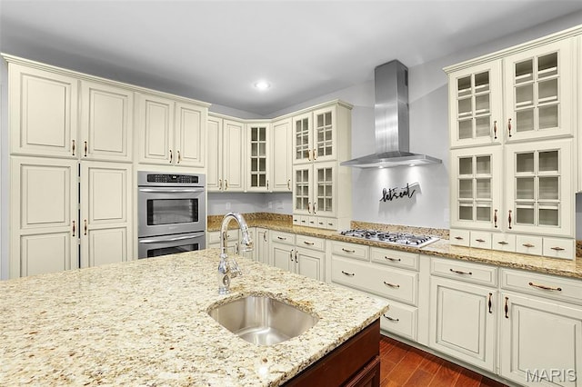 17917 Rosemar Ln, Wildwood, MO 63038 - kitchen featuring wall chimney exhaust hood, stainless steel appliances, dark wood-style flooring, light stone countertops, and recessed lighting