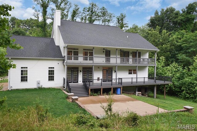 17917 Rosemar Ln, Wildwood, MO 63038 - back of property featuring a patio area, a lawn, ceiling fan, a chimney, and a deck