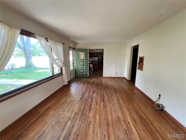 503 Cumberland St, Coffeen, IL 62017 - unfurnished living room with dark wood finished floors