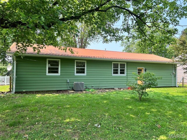 503 Cumberland St, Coffeen, IL 62017 - rear view of property featuring a yard, cooling unit, and metal roof