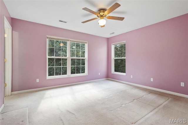 7611 State Route 30, Dittmer, MO 63023 - spare room featuring a ceiling fan, baseboards, and carpet