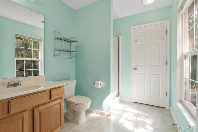 7611 State Route 30, Dittmer, MO 63023 - full bathroom with vanity, baseboards, a shower stall, and toilet
