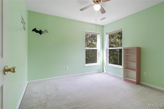 7611 State Route 30, Dittmer, MO 63023 - carpeted spare room featuring ceiling fan and baseboards