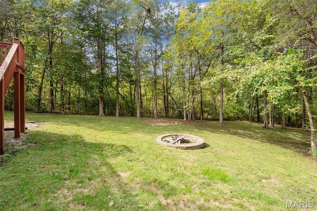 7611 State Route 30, Dittmer, MO 63023 - view of green lawn featuring an outdoor fire pit